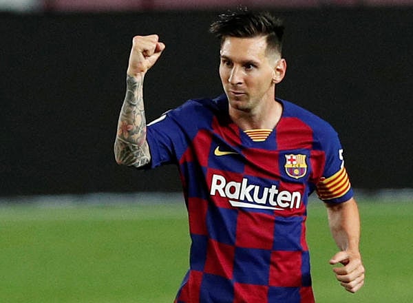 Barcelona's Lionel Messi celebrates scoring their second goal, as play resumes behind closed doors following the outbreak of the coronavirus disease. Credit: Reuters