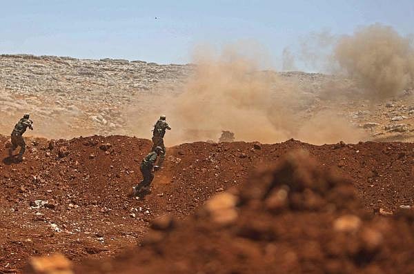 Members of Syria's opposition National Liberation Front take part in a military training in the northern countryside of Idlib province, on July 1, 2020. Credit: AFP Photo