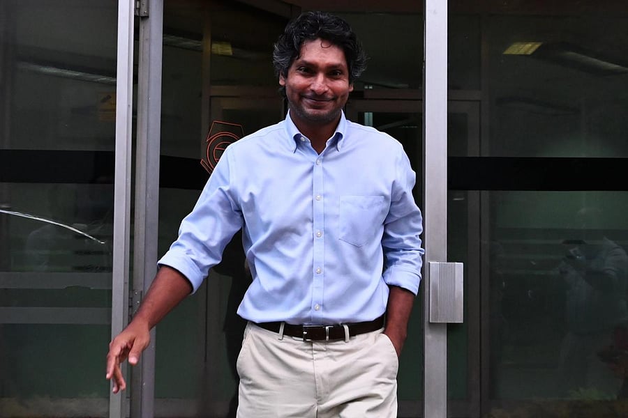 Sri Lanka's cricketer Kumar Sangakkara, captain of the 2011 Cricket World Cup, leaves the Special Investigation Unit after questioning by police (AFP Photo)