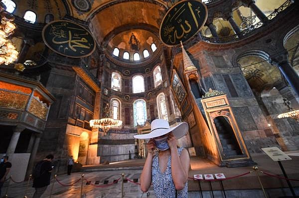 A tourist visits the inside of Hagia Sophia on July 10, 2020, in Istanbul, before a top Turkish court revoked the sixth-century Hagia Sophia's status as a museum, clearing the way for it to be turned back into a mosque. Credit: AFP Photo