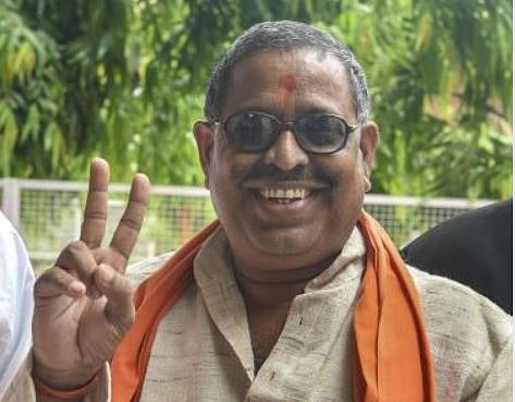 Vishwa Hindu Parishad leader Santosh Dubey arrives at a special CBI court for a hearing in the Babri mosque demolition case, in Lucknow. Credit: PTI Photo