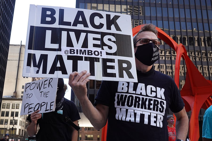 Activists hold a rally in the federal building plaza. Credits: AFP Photo