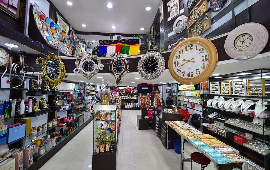 A shopkeeper waits for customers at a gift shop, during Unlock 2.0, in Kolkata. Credit: PTI Photo
