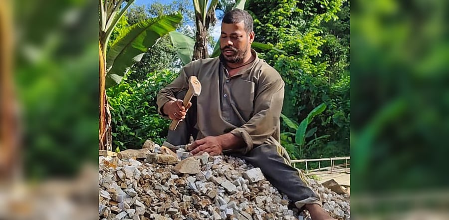 India's wheelchair national cricket team player Rajendra Singh Dhami breaks rocks under a government scheme in his hometown of Raikot in the northern Uttarakhand state. Credit: AFP