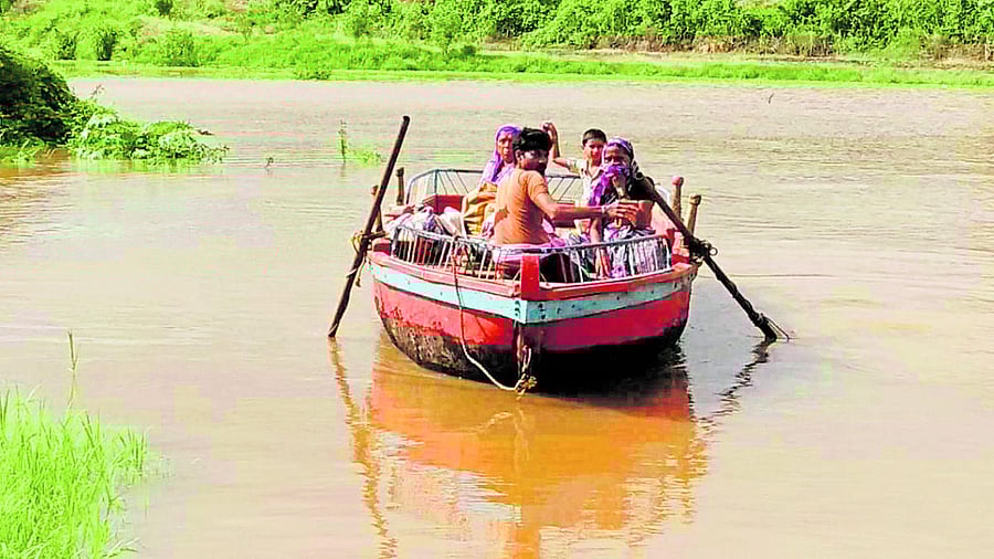 People ferried across swollen rivers.