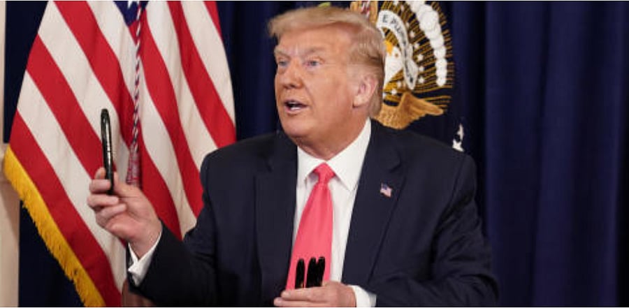 US President Donald Trump speaks after signing executive orders for economic relief during a news conference amid the spread of the coronavirus disease. Credit: Reuters Photo