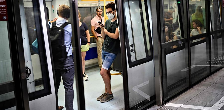 The best way to reduce the spread of infection on public transit and elsewhere is to wear and mask and stay 6 feet from others, experts say. Credit: AFP Photo