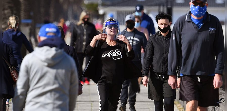 Victoria state Premier Daniel Andrews announced 410 new cases and 21 fatalities -- marking Australia's deadliest day so far -- but said the state "certainly" seemed to be flattening the curve. Credit: AFP Photo