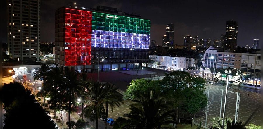 The city hall in the Israeli coastal city of Tel Aviv is lit up in the colours of the United Arab Emirates national flag. Credit: AFP Photo