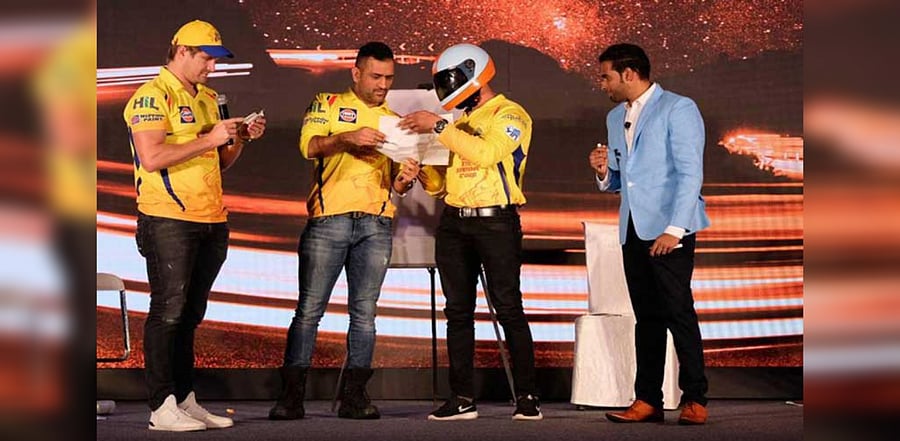 Narpath Raman with M S Dhoni and other cricketers of the Chennai Super Kings team. 