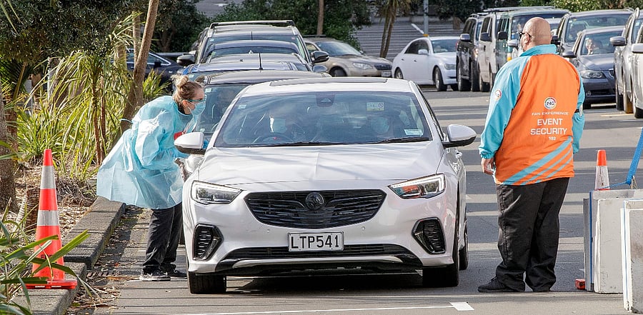 Testing being conducted by health workers at a Covid-19 testing station setup at Eden Park, National Sports Stadium, in Auckland. Credit: AFP Photo