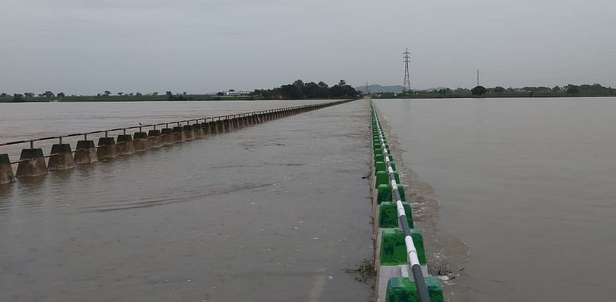 A view of a submerged bridge near Kollur(M) village in Yadgir district. Credit: DH Photo