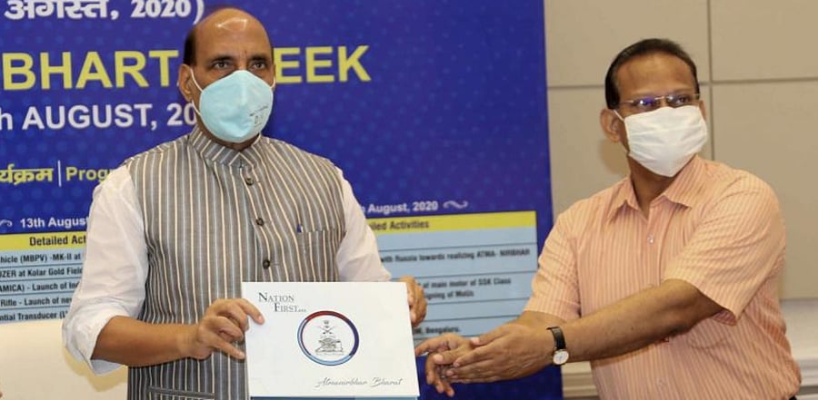 Defence Minister Rajnath Singh and Secretary (Defence Production) Raj Kumar. Credit: PTI Photo