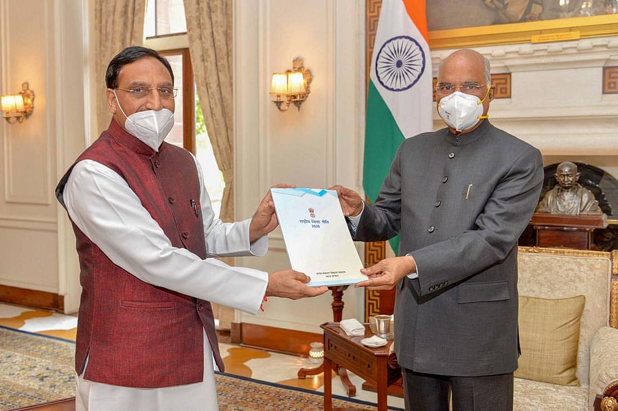 New Delhi: HRD Minister Ramesh Pokhriyal Nishank presents to President Ram Nath Kovind a copy of the new National Education Policy 2020, in New Delhi, Tuesday, Aug 4, 2020. (PTI Photo) (PTI04-08-2020_000097B)