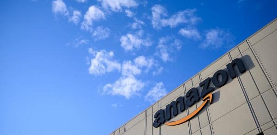 The Amazon logo is viewed at the 855,000-square-foot Amazon fulfillment center in Staten Island, one of the five boroughs of New York City. Credit: AFP