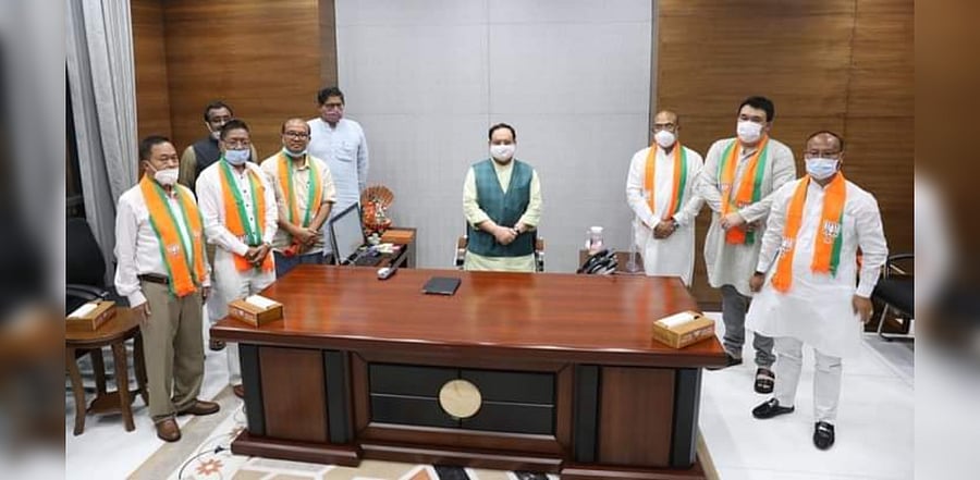 Former Congress MLAs meeting BJP president JP Nadda in New Delhi on Wednesday. Credit: DH