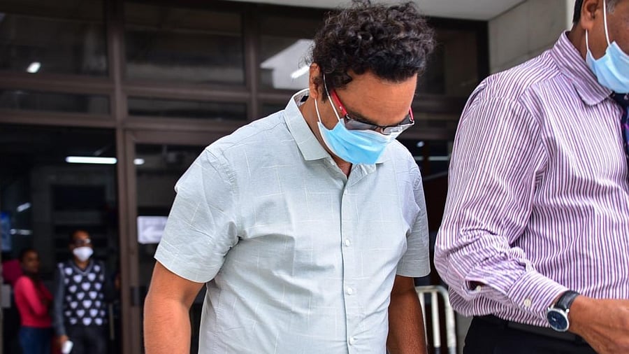 Sunil Kumar Nandeshwar (L), the captain of the MV Wakashio bulk carrier that had run aground, leaves from the court after he and his deputy was charged under the piracy and maritime violence act in Port Louis, Mauritius. Credit: AFP