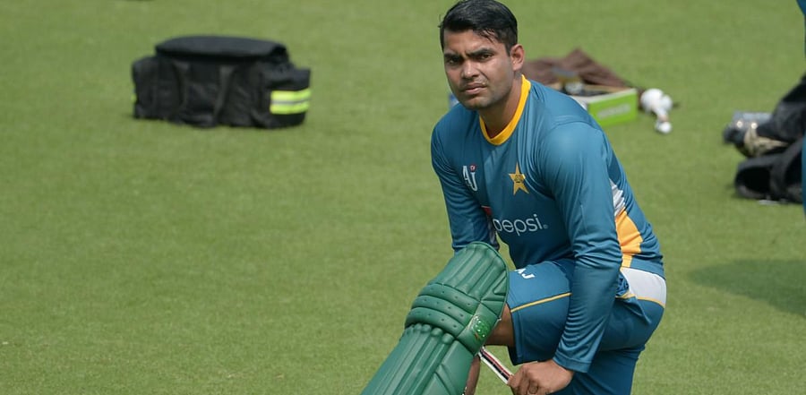 Umar was banned for three years in April by a one-man disciplinary panel of the board after he failed to report two approaches to spot-fix matches in the Pakistan Super League in February. Credit: AFP Photo