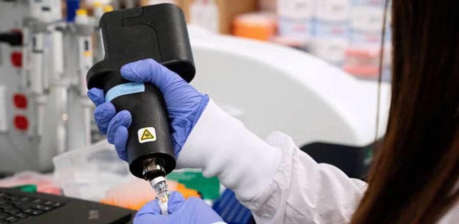 A scientist at RNA medicines company Arcturus Therapeutics research a vaccine for the novel coronavirus. Credit: Reuters
