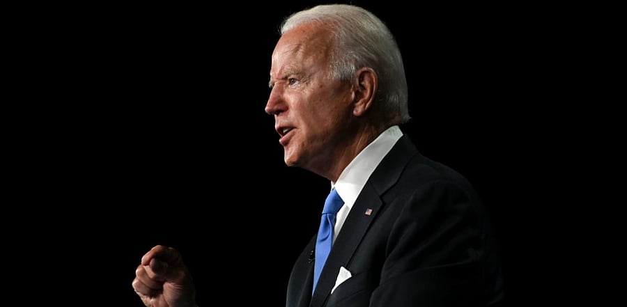 "If I'm your president, on Day 1 we'll implement the national strategy I've been laying out since March," Biden said. Credit: AFP Photo