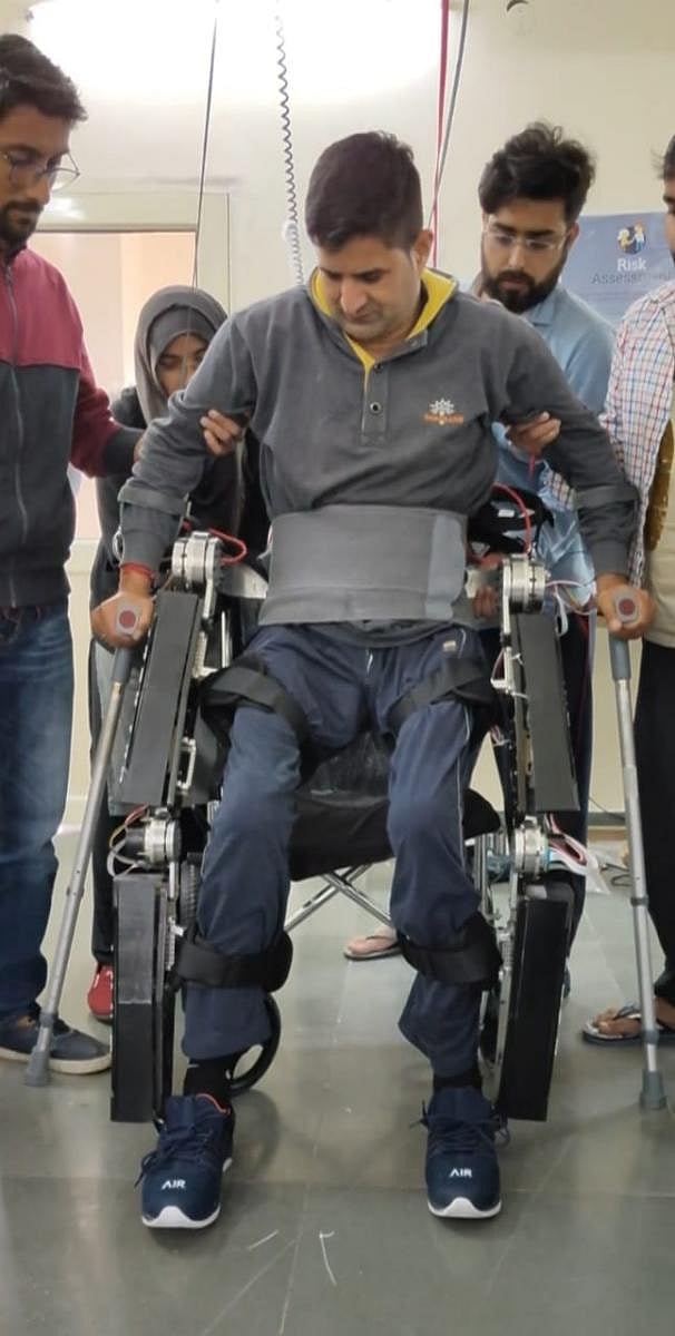 A former Indian Army paraplegic soldier trains with the robotic gear.