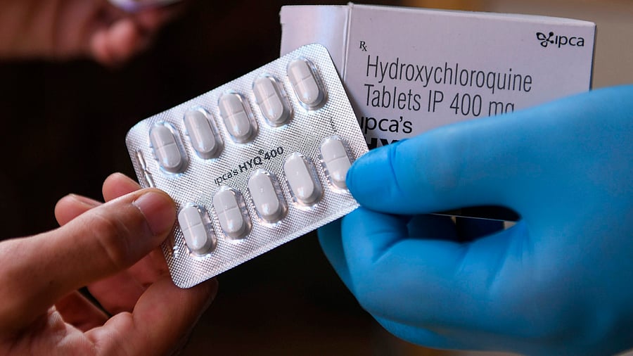 A vendor displaying hydroxychloroquine (HCQ) tablets at a pharmacy. Credits: AFP Photo