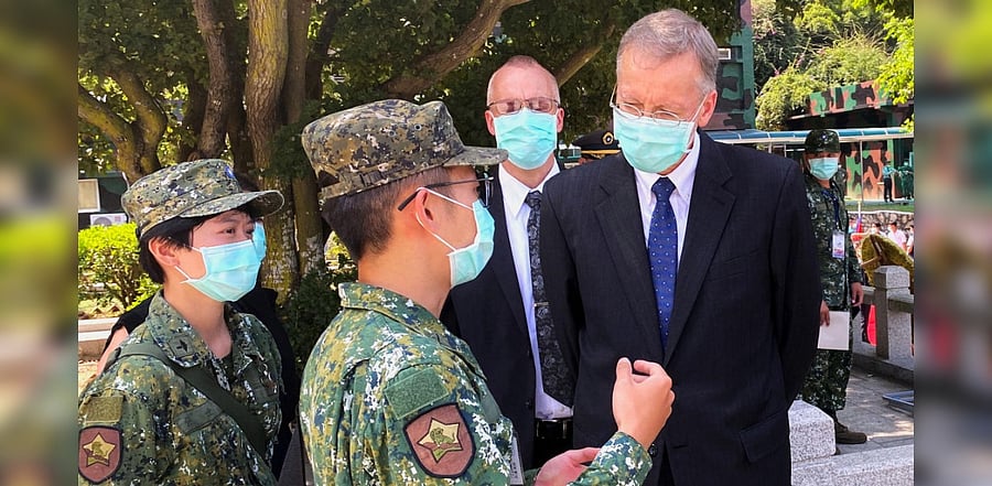 Brent Christensen talks to soldiers after attending an event to mark the 62nd anniversary of the Second Taiwan Strait crisis in Kinmen. Credit: Reuters Photo