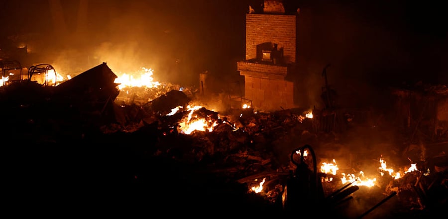A home burns during the CZU Lightning Complex Fire in Boulder Creek, California, U.S. August 20, 2020. Credit: Reuters Photo