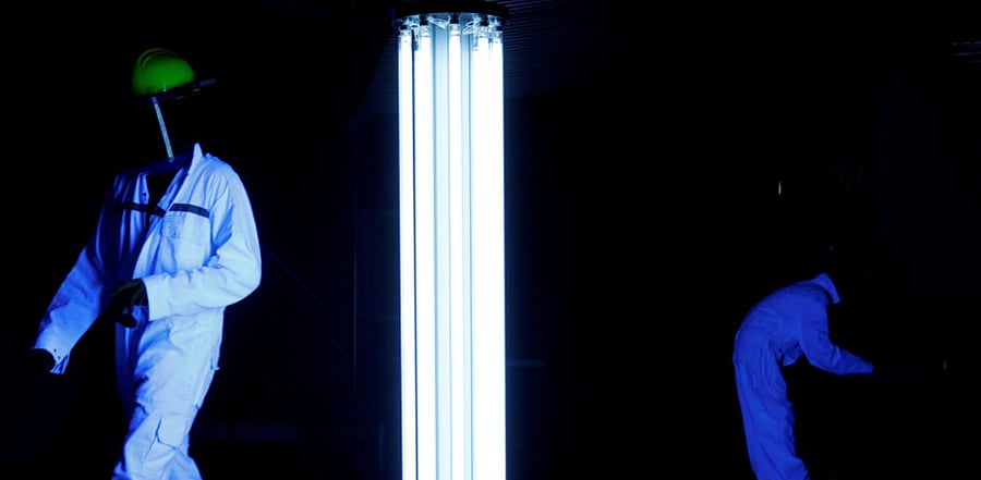 Workers disinfecting office in Singapore. Credit: Reuters