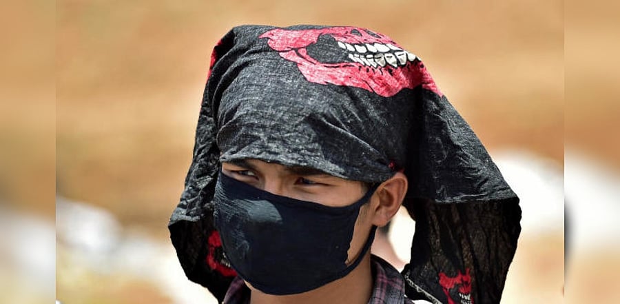 A student from Tripura wears a mask amid the coronavirus pandemic. Credit: DH File Photo