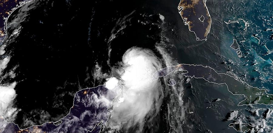 Tropical Storm Laura pounded Cuba with heavy rains as it barrelled toward the US, where forecasters predicted it would strengthen to a hurricane after leaving 24 people dead and a swath of destruction in the Caribbean. Credit: AFP Photo