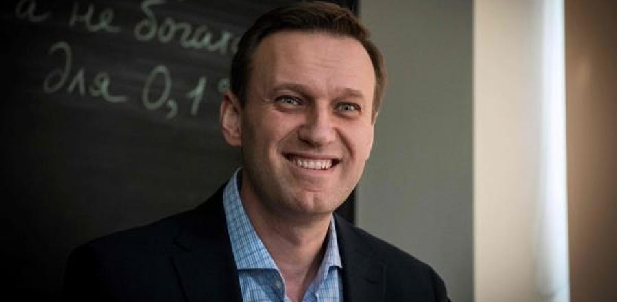 Russian opposition leader Alexei Navalny smiles during an interview. Credit: AFP Photo