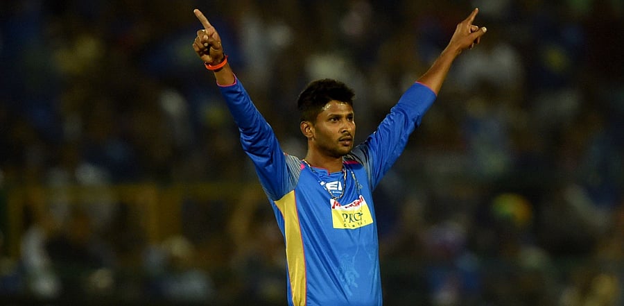 Krishnappa Gowtham with his previous team Rajasthan Royals. Credit: AFP Photo