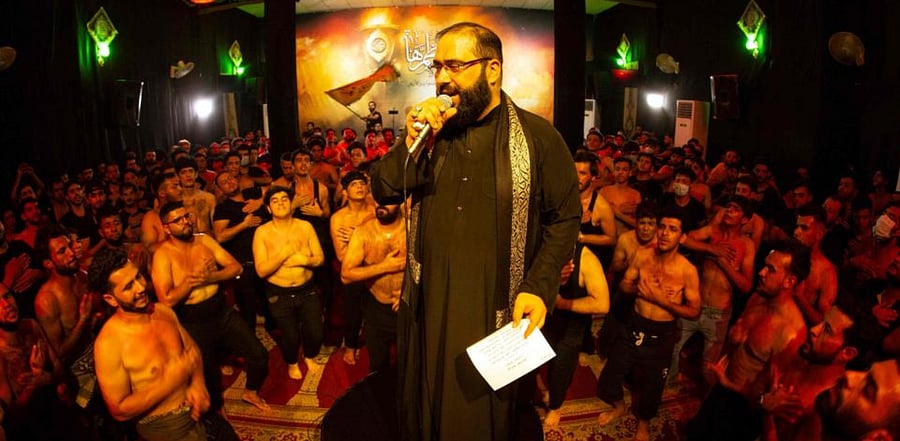 An Iraqi Shiite cleric recites the story of Ashura during a mourning ritual to commemorate martyrdom of Prophet Mohammad's grandson Imam Hussein during the Islamic month of Muharram. Credit: AFP