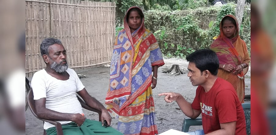 A rejected applicant is being provided counselling in Chirang district in western Assam by a volunteer of CJP, an NGO. Credit: CJP