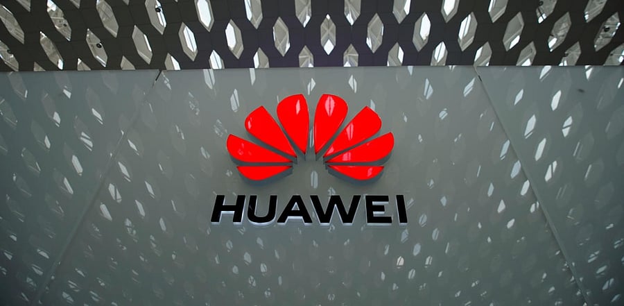 A Huawei company logo is seen at the Shenzhen International Airport in Shenzhen in Shenzhen, Guangdong province, China. Credits: Reuters