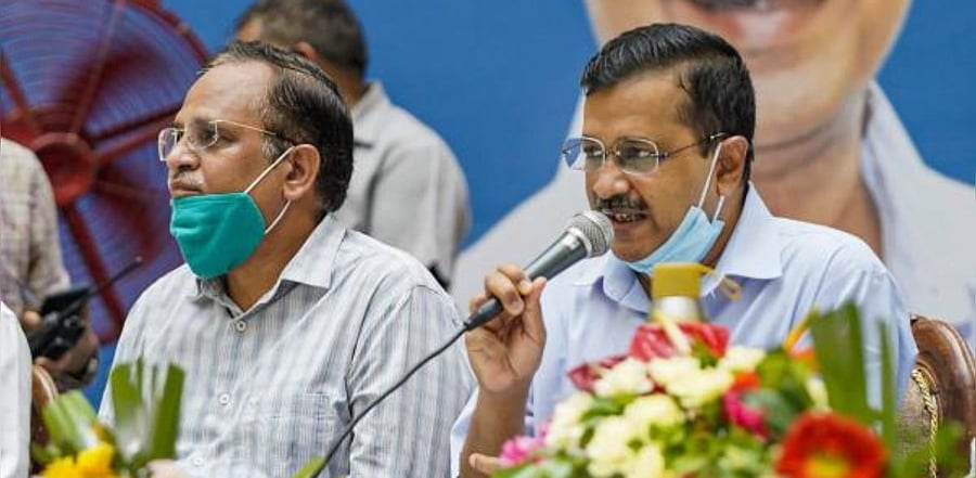 Delhi Chief Minister Arvind Kejriwal along with Health Minister Satyendar Jain. Credit: PTI Photo