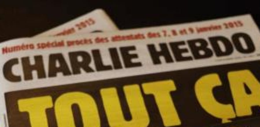 Covers of French satirical weekly Charlie Hebdo reading "All of this, just for that," to be published on September 2 to mark this week's start of the trial for 14 accused in January 2015 jihadist attacks in Paris. Credit: AFP Photo