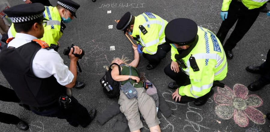 Extinction Rebellion climate activists protest in London. Credit: Reuters