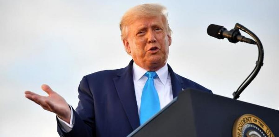 US President Donald Trump gestures as he speaks during a campaign event. Credit: AFP
