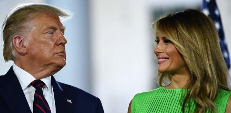 US First Lady Melania Trump smiles at US President Donald Trump. Credit: AFP