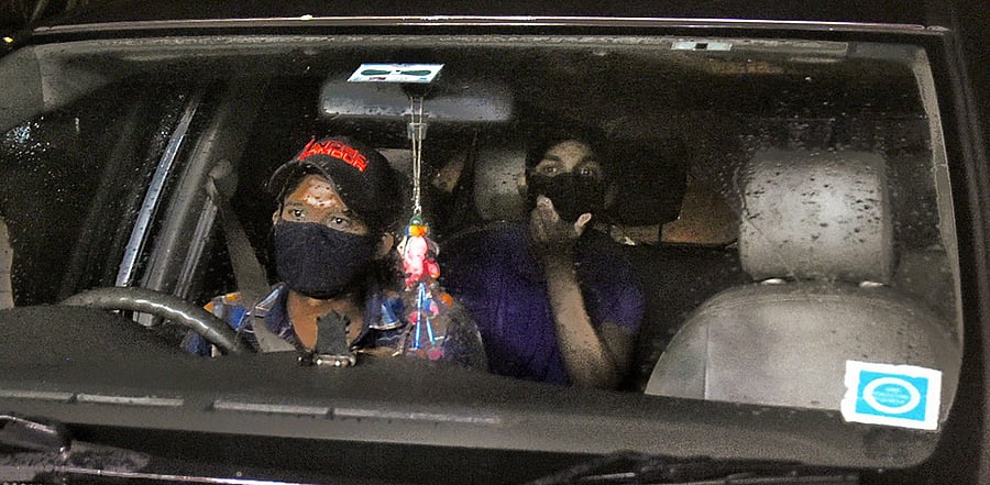 Rhea Chakraborty's brother Showik in a car in Mumbai. Credit: PTI Photo