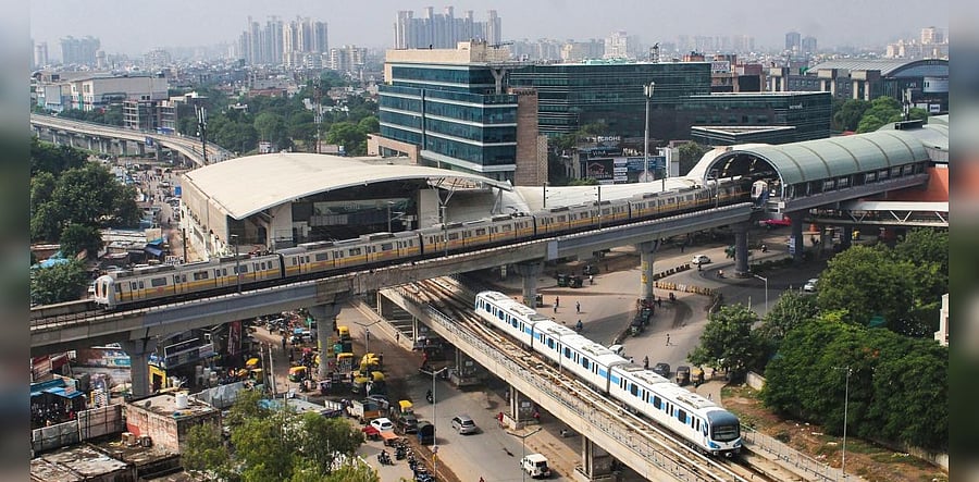 Delhi Metro and Rapid Metro train during a trial run as services for commuters are set to resume from tomorrow with certain restrictions, amid the ongoing coronavirus pandemic, in Gurugram, Sunday, Sept. 6, 2020. Credit: PTI Photo