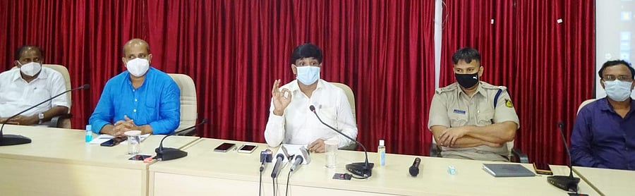 Deputy Commissioner G Jagadeesha chairs a meeting at his office in Manipal.