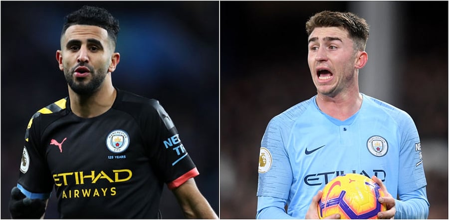 Manchester City winger Riyad Mahrez and defender Aymeric Laporte. Credit: Getty Images