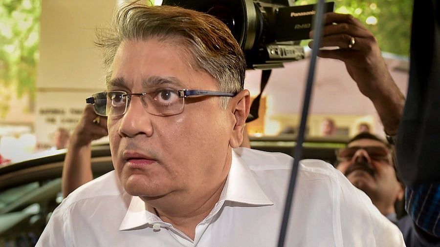 Deepak Kochhar, husband of former ICICI Bank CEO Chanda Kochhar, arrives to appear before Enforcement Directorate (ED) in connection with a bank loan fraud and money laundering case probe. Credits: PTI Photo