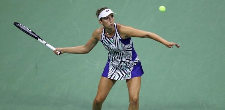 Elise Mertens of Belgium returns a volley during a match. Credit: AFP