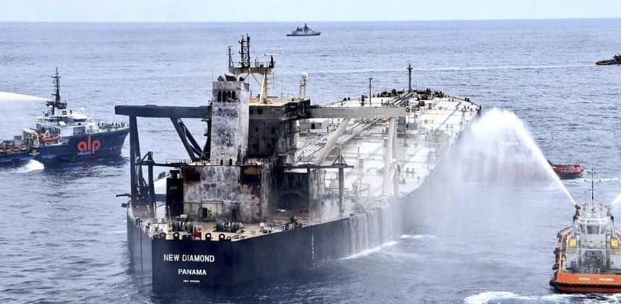 Sri Lankan Navy trying to douse new fire. Credit: AFP Photo