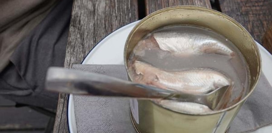 A can of fermented Baltic herring, known as surstromming in Swedish, sits on a table in the restaurant belonging to chef Malin Soderstrom. Credit: AFP