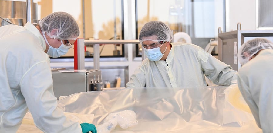 Scientists work inside a facility in Australia. Credit: Reuters